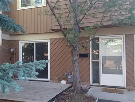 A beautiful 2 bed townhouse, close to the mountains + basement is available now | 4940 39 Avenue Southwest, Calgary