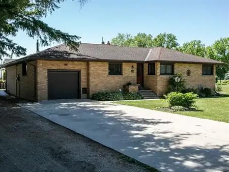 Three bedrooms, one bath, spacious detached home located in a quiet neighbourhood. Attached single car garage and double wide