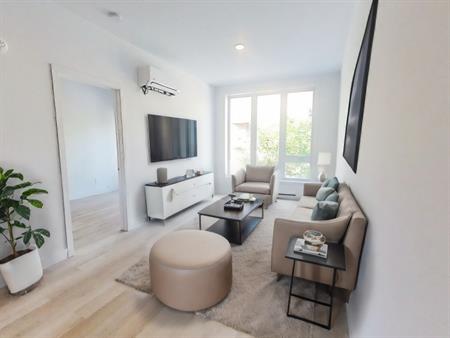 3 1/2 DANS IMMEUBLE NEUF
