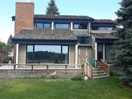 Executive home in Deer Run Estates backing onto Fish Creek Park. | 2503 Deer Side Drive SE, Calgary