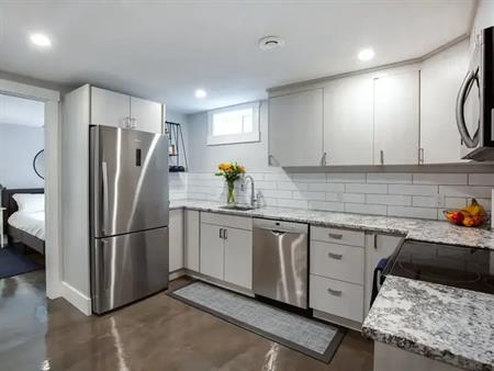 FURNISHED, LEGAL Suite, Short Walk to UofC & C-Train. Garage! Available Aug 16! | Calgary