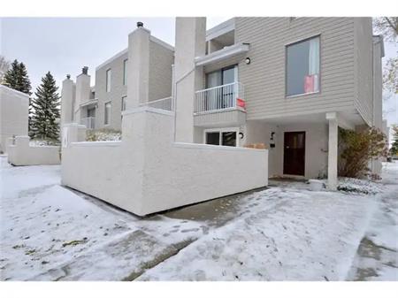 Walking to UC Ctrain  Varsity 2 bdrm stacked townhouse with 1 parking stall | 805 - 3500 Varsity Drive Northwest, Calgary