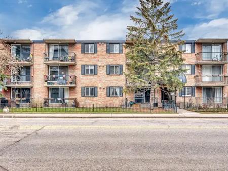 2 Bedroom /1 Bath South Facing Condo with Covered Parking | 101 - 934 2 Avenue Northwest, Calgary