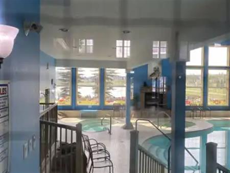 40+  Building - Cozy Top Floor Condo, Many amenities | 151 Country Village Road Northeast, Calgary