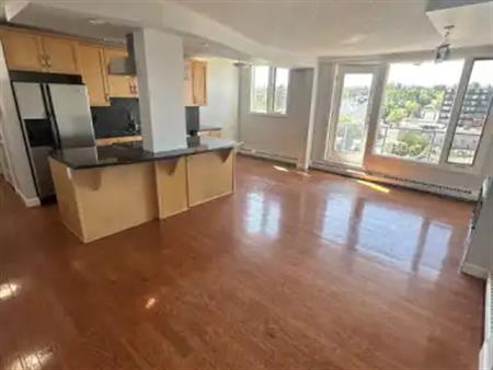 Big bright PET FRIENDLY 2 bedroom condo with PARKING SPOT steps from 17th ave! | 505 - 1225 15 Avenue Southwest, Calgary