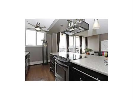 Executive TOP FLOOR sw Corner in TRENDY MISSION | 603 - 505 19 AVE SW, Calgary