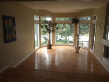 Beautiful 3 bed 2 bath family home on quiet street backing onto green space | Calgary