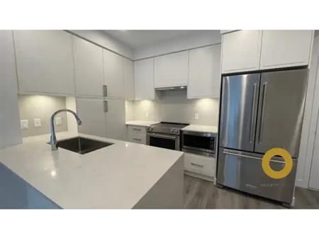 913sf 2 Bed + Den & 2 Bath at VISTA in Burquitlam | 700 Clarke Road, Coquitlam