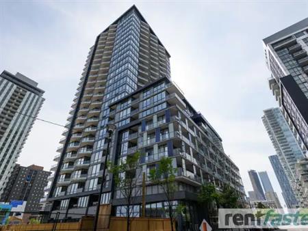 Beautiful 1 bdrm + den corner unit, offers extra light, view of city and river | 519 - 615 6 Ave SE, Calgary