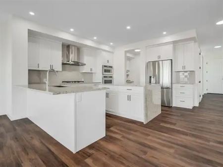 5 BEDROOM HOME WITH 2 MASTERS AND A SPICE KITCHEN | 124 Lewiston Landing Northeast, Calgary