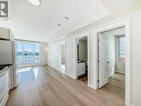 Fresh painting and new Vinyl floor University City 2 bed 1 bath condo | 207 - 3820 Brentwood Road NW, Calgary