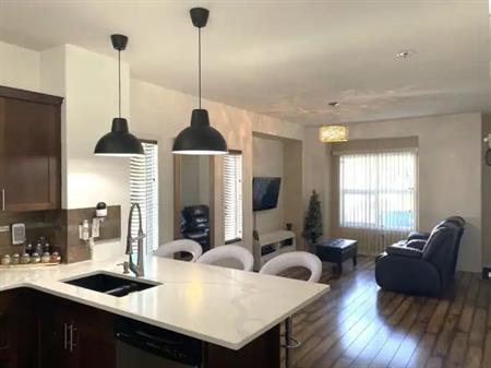 Three-bedroom unit with 2.5 bath. End unit. Quartz countertop. Vinyl flooring. | 111 Tarawood Lane Northeast, Calgary