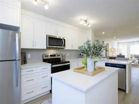 NEW ROOFTOP PATIO, 3 STORY, 2 MASTER BEDROOMS TOWNHOUSE | Calgary