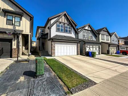 Modern 5-Bedroom Front-Garage Home in Arbour Lake | Calgary