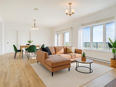 EN PROMOTION : Spacieux 5 1/2 à louer - Dès maintenant - Garage - Ascenseur