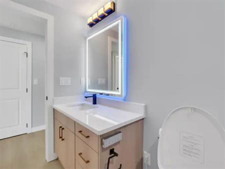 WALK-OUT LARGE & BRAND NEW 2 bedroom and 1 bath Basement Apartment | 144 Edith Place North West, Calgary
