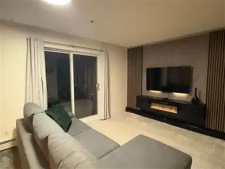 Scenic Mountain View Condo with Fireplace, Balcony, and Lake Club Amenities | 302 - (Rocky Ridge), Calgary, Alberta, Calgary