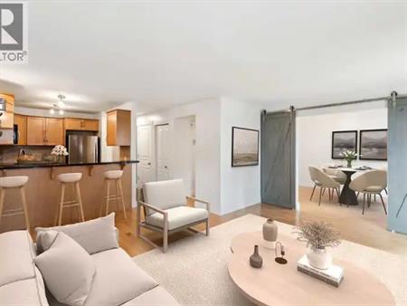3 bed, 2 bath, deck off entrance & balcony off bedroom, in suite laundry | 34 Glamis Green Southwest, Calgary