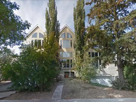5 bedroom 3.5 bathroom triplex with 2 car detached garage located in Bonnie Doon | 9232 91 Street, Edmonton