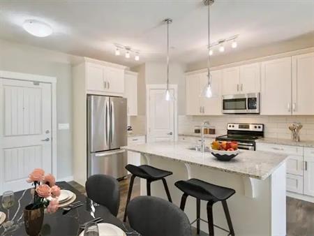 2 Bed/2 Bath Main Floor Condo | A/C & Huge South-Facing Patio & Lake access | 103 - 130 Auburn Meadows View SE, Calgary