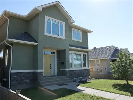 Custom built 4 bdrm inner city house - garage + spacious private yard | Calgary