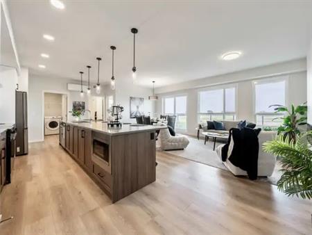 Luxury 2-Bed + Den with AC, Fireplace & Stunning Foothills Views | 2205 - 550 Belmont Street Southwest, Calgary