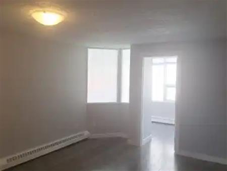 1BR + Den Converted to 2BR — Heated Parking, In-Suite Laundry, Steps to 17 Ave | 504 - 626 15 Avenue Southwest, Calgary