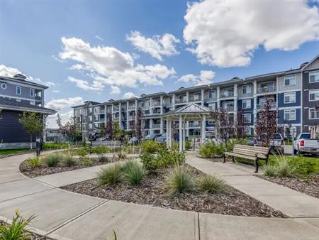 2 BED & 1 BATH TOP FLOOR CONDO WITH A/C, HEATED UNDG PARKING & GREAT VIEWS! | 403 - 400 Auburn Meadows Common Southeast, Calg