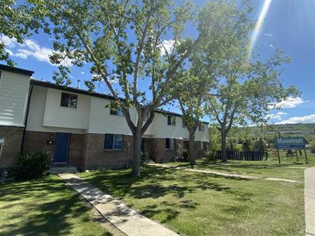 Bow River Townhomes | 6347 Bowview Road NW, Calgary