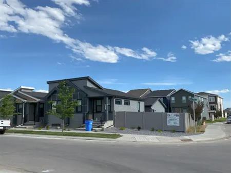 New Bungalow in Seton with Triple Detached Garage & HOA Access | Calgary