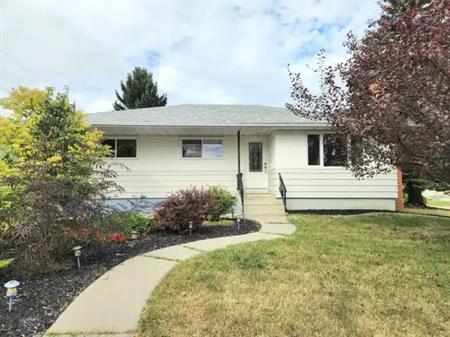 Detached Bungalow with oversize garage in Kingsland | Calgary