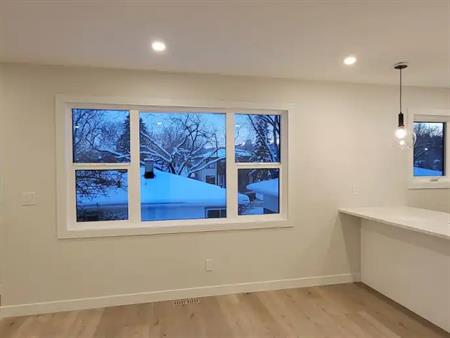 Parkdale Carriage Suite w/Inside Private Parking Stall | Calgary