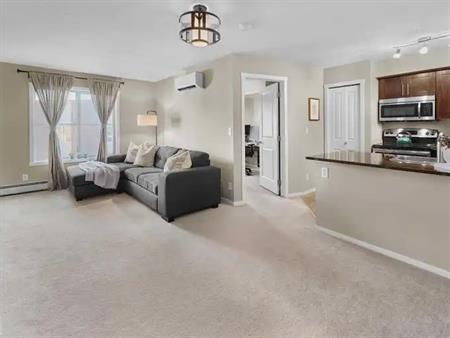 Top-floor 2-bed 2-bath condo with 2 parkings in desirable MacTaggart | 5816 Mullen Place Northwest, Edmonton