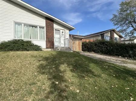 Top Floor Duplex | 218 Queensland Place SE, Calgary