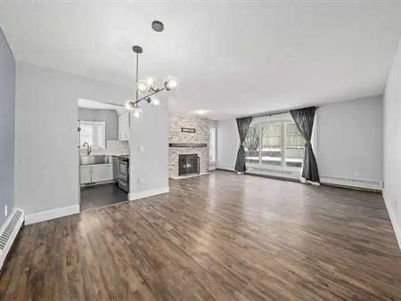 Huge 1-Bed Condo, Heated Underground Parking & Massive Private Patio/Backyard! | 109 - 333 Garry Crescent Northeast, Calgary