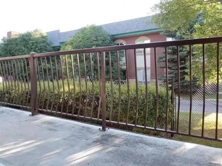 FULLY FURNISHED CONDO IN ACADIA + 25 living | 49c - 231 Heritage Dr SE, Calgary