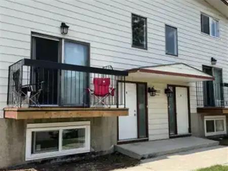 Renovated 4 Bedroom Townhouse in Forest Lawn | 1707 42 Street Southeast, Calgary