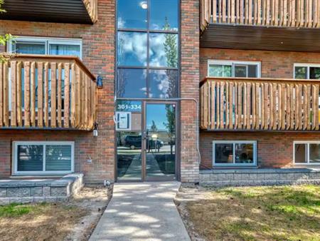 UTILITIES Incl. 2 Bed 1 Bath condo unit close to C Train and South Centre Mall | 304 - 11620 Elbow Dr SW, Calgary