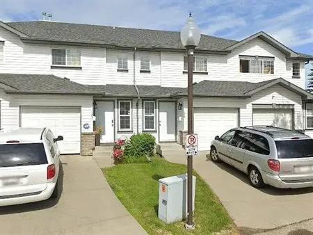 Step into this beautifully refreshed 3-bedroom end-unit townhome with a single a | 123 - 16823 84 Street Northwest, Edmonton