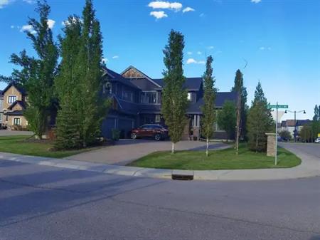 Home with triple garage and big back yard | 62 Silverado Ranch Way Southwest, Calgary