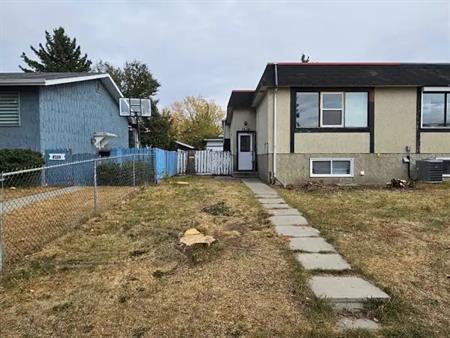 Main floor 2 bedroom 1.5 bathroom duplex for rent in Thorncliff. | 6208 Beaver Dam Way Northeast, Calgary