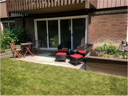 Spacious 1 Bedroom Condo with Pool, Walkout Patio with Garden | Calgary