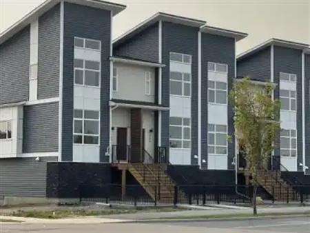 Modern 3-Bedroom Townhome Backing onto Pond & Pathways in Walden | 122 - 122 Walden Lane Southeast, Calgary
