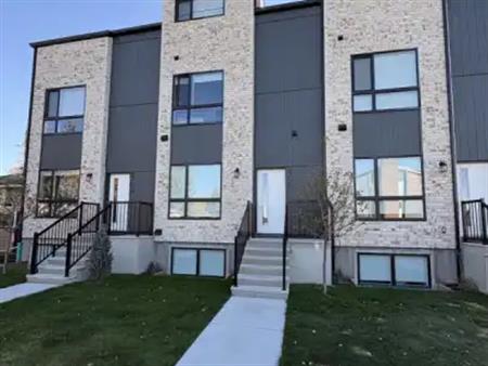 Modern private room for rent with a shared living space. | 455 35 Avenue Northwest, Calgary