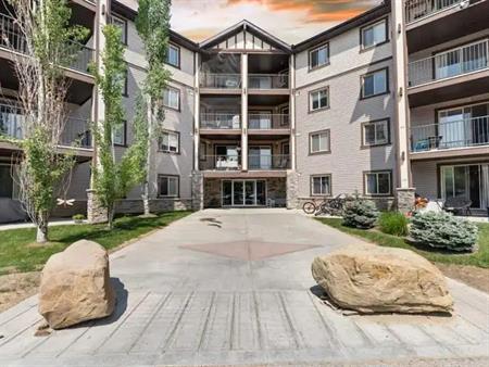 Spacious 2-bedroom condo & 1 bath with ALL utilities, included (Panorama Hills) | 4205 - 60 Panatella Street Northwest, Calga
