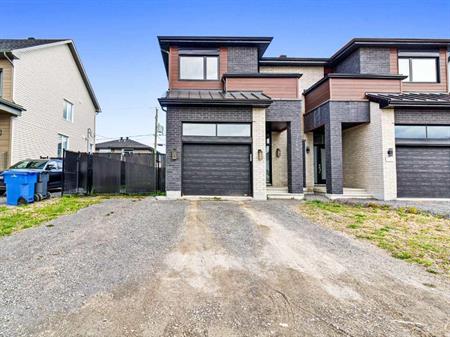 Maison impeccable avec Garage a St-marthe-sur-le-lac