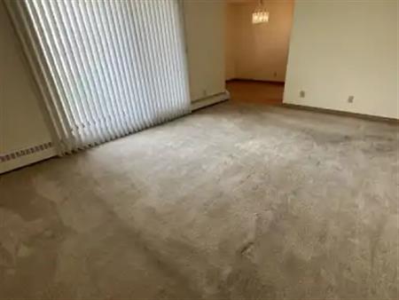 Main Floor 2 Bedrooms. In suite laundry Includes heat,water &underground parking | 101 - 10511 19 Ave NW, Edmonton