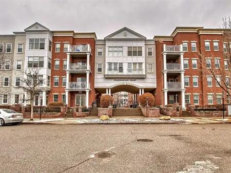 Furnished 1 Bed + Den w/Huge Private Patio in Gateway Garrison Green | 5605 Henwood St SW, Calgary