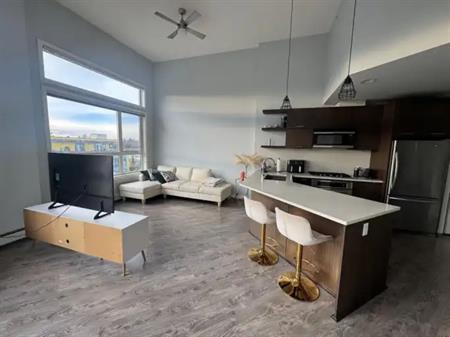 Bright, Furnished Bridgeland Condo with City Views and All utilities included | #412 - 707 4 St NE, Calgary