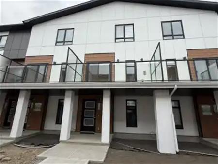NEW Townhouse West District SW | 117 - 8235 8 Avenue Southwest, Calgary